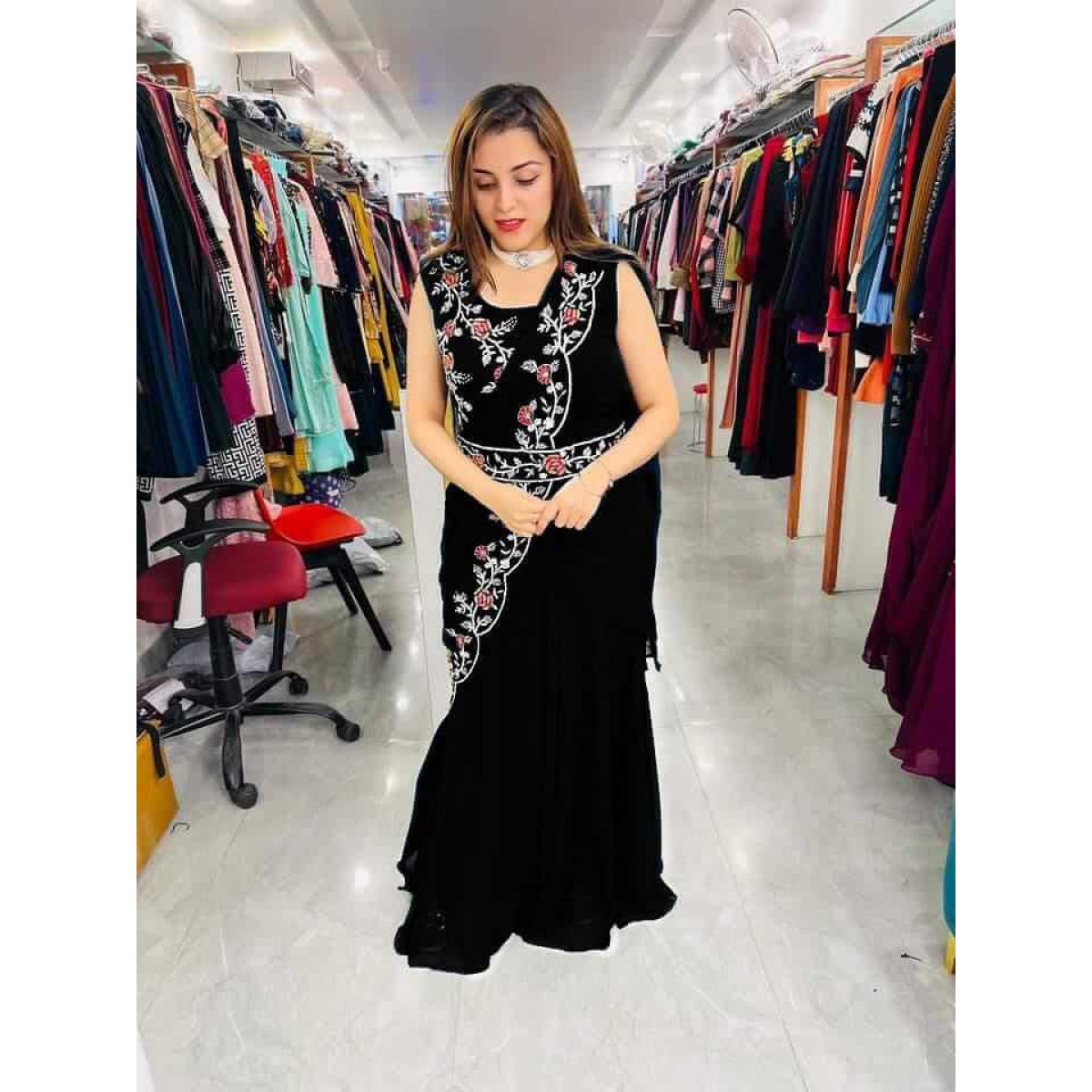 Maroon saree gown in net with a fancy cape adorn in zardosi and moti  embroidered work